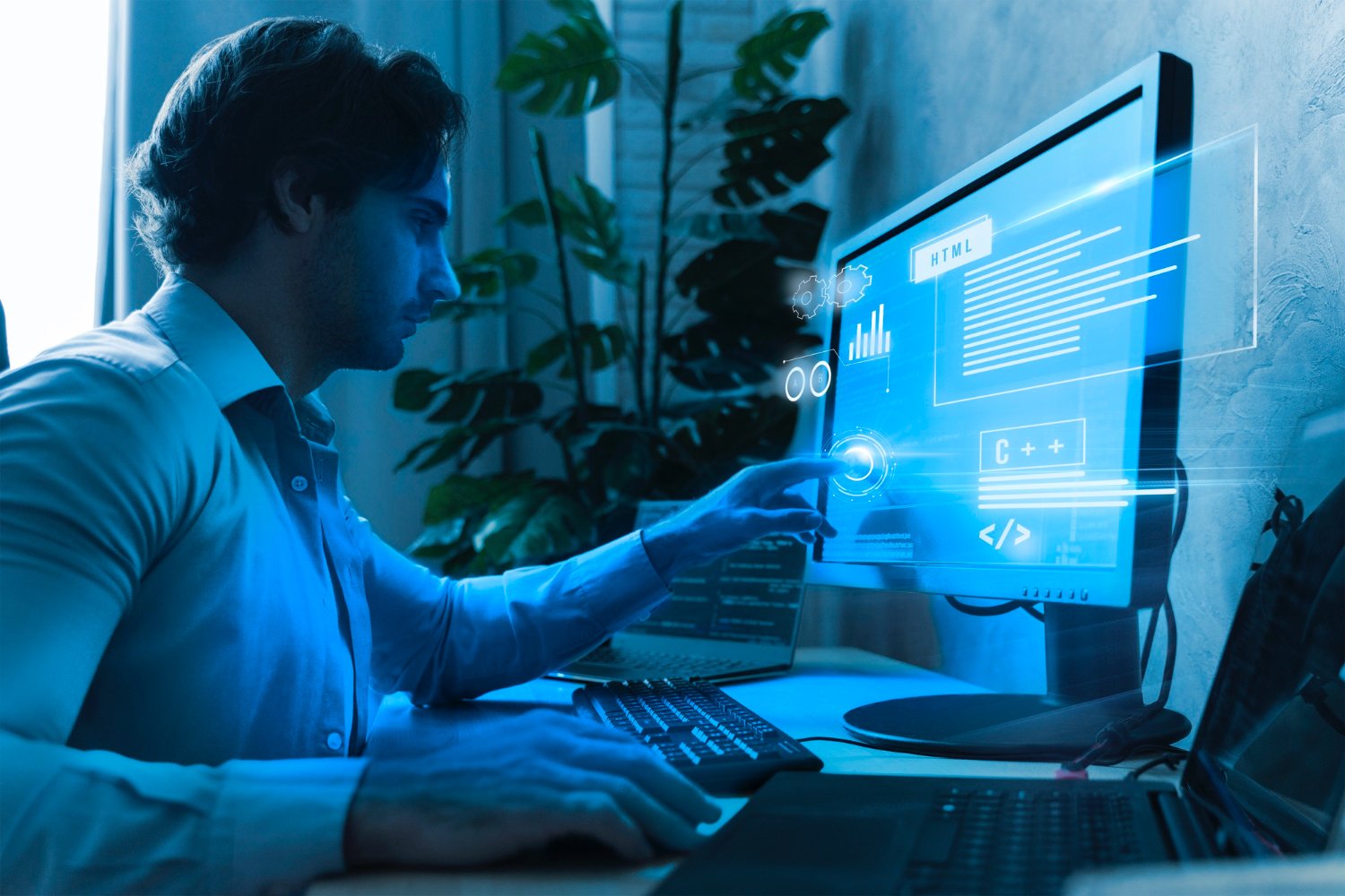 Business team analyzing data on digital screens